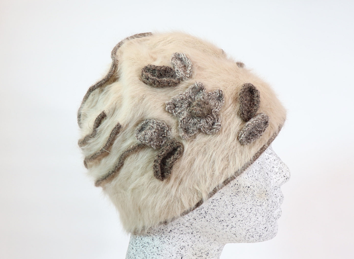 Angora beanie with flowers and piping