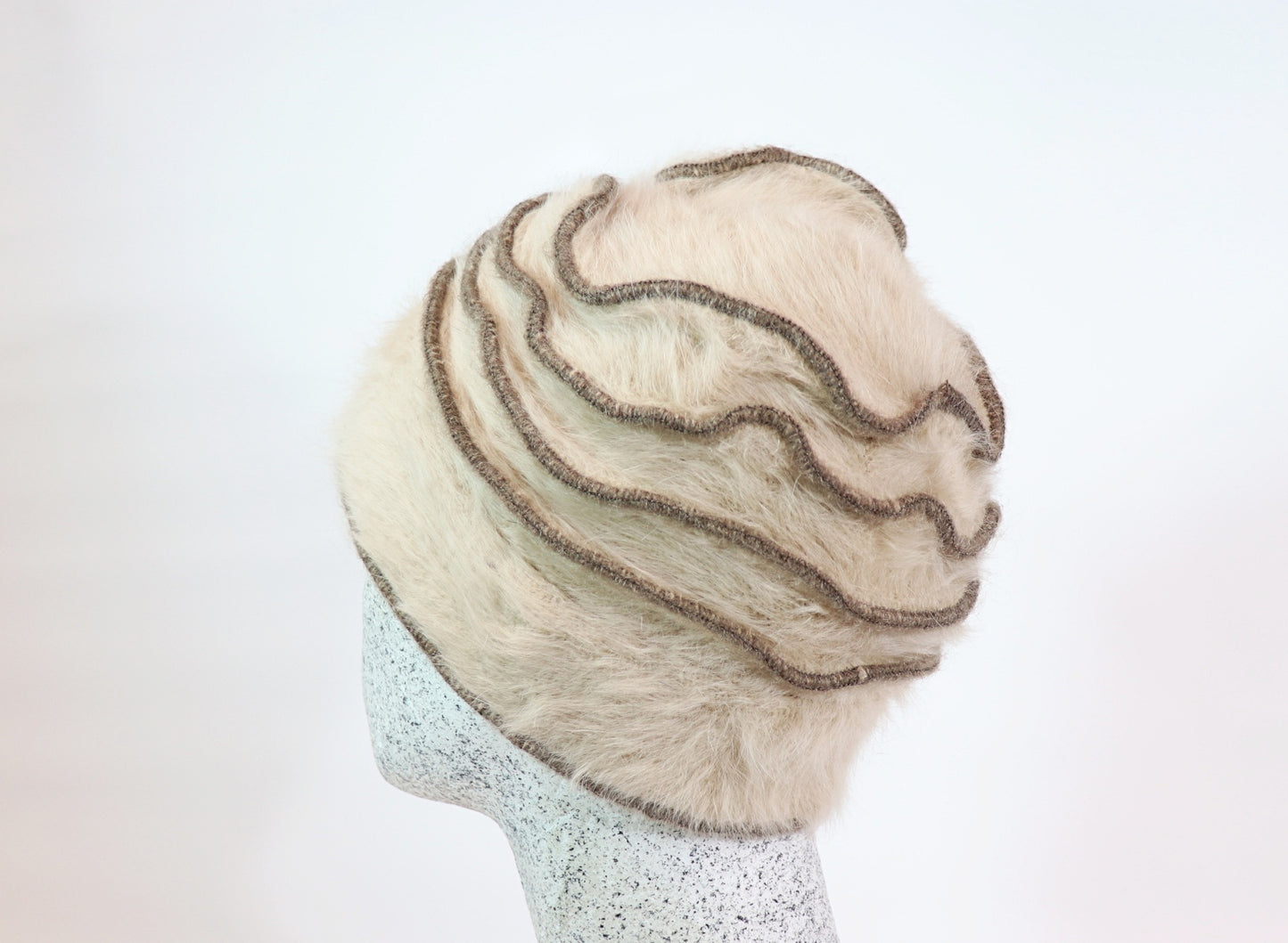 Angora beanie with flowers and piping