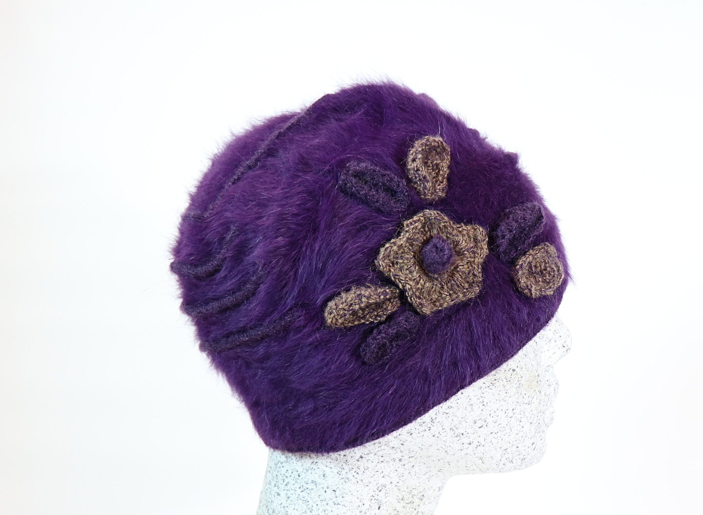 Angora beanie with flowers and piping