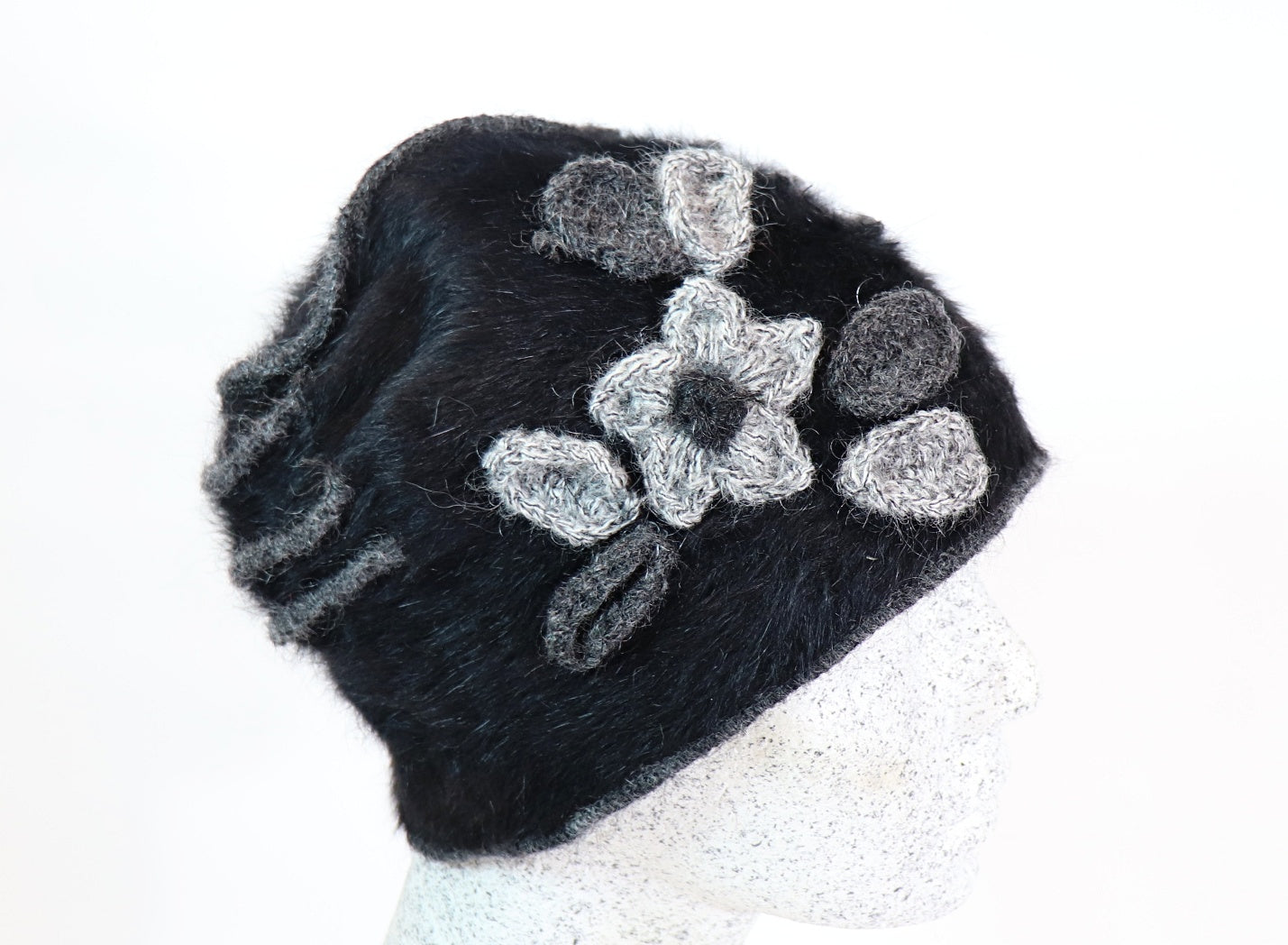 Angora beanie with flowers and piping