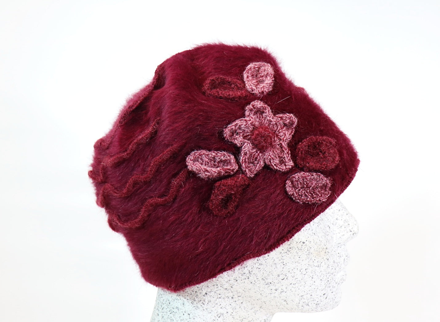 Angora beanie with flowers and piping