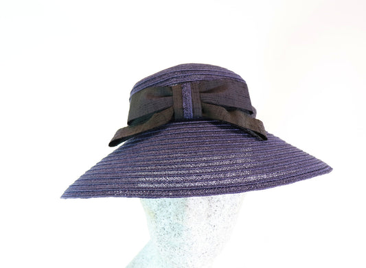 Audrey H. - Straw hat with bow