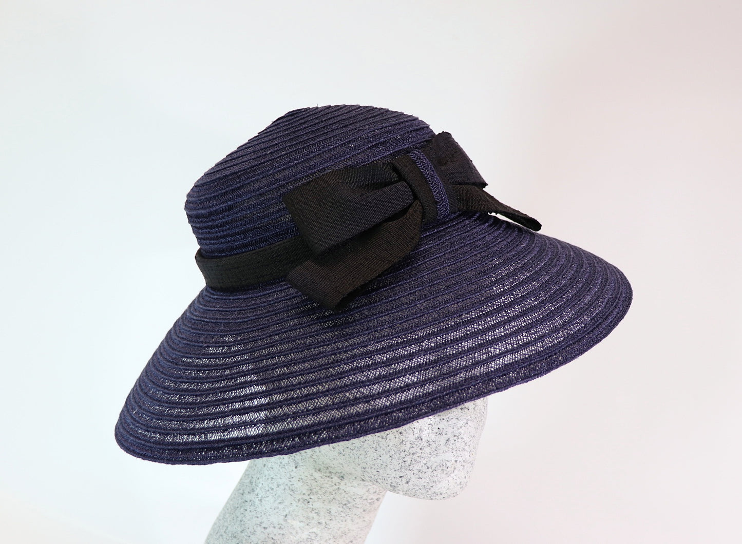 Audrey H. - Straw hat with bow