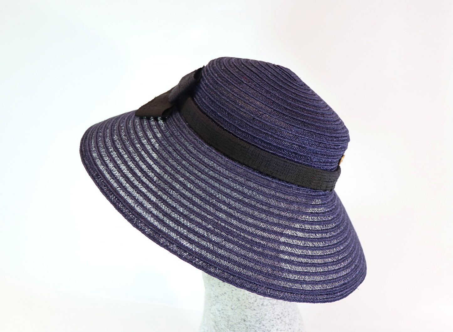 Audrey H. - Straw hat with bow