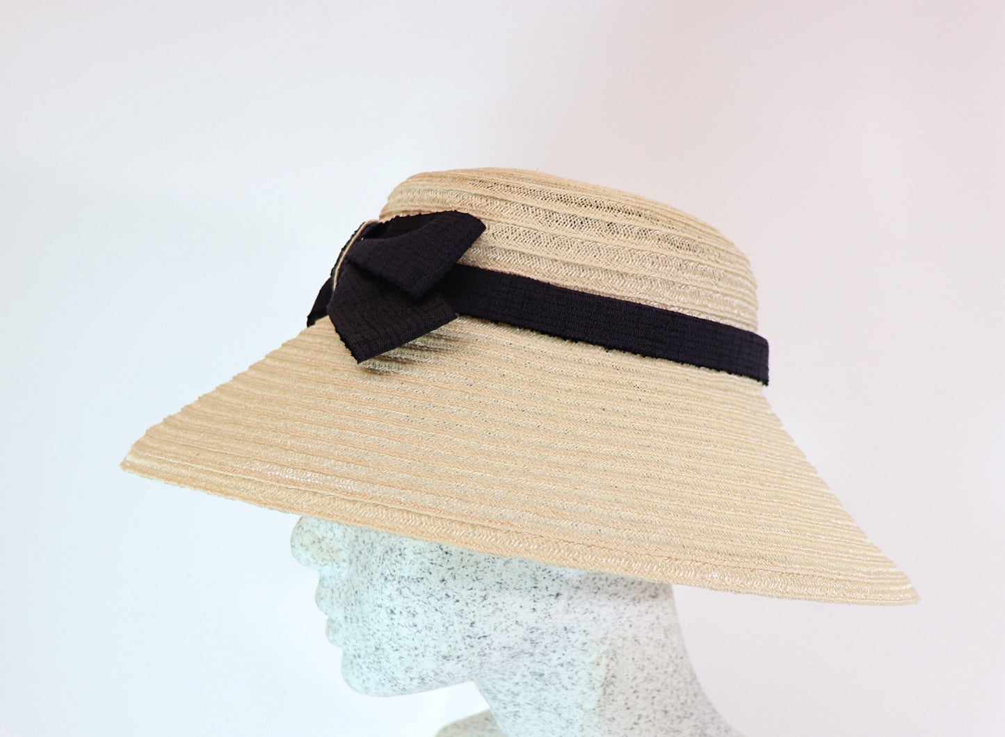 Audrey H. - Straw hat with bow