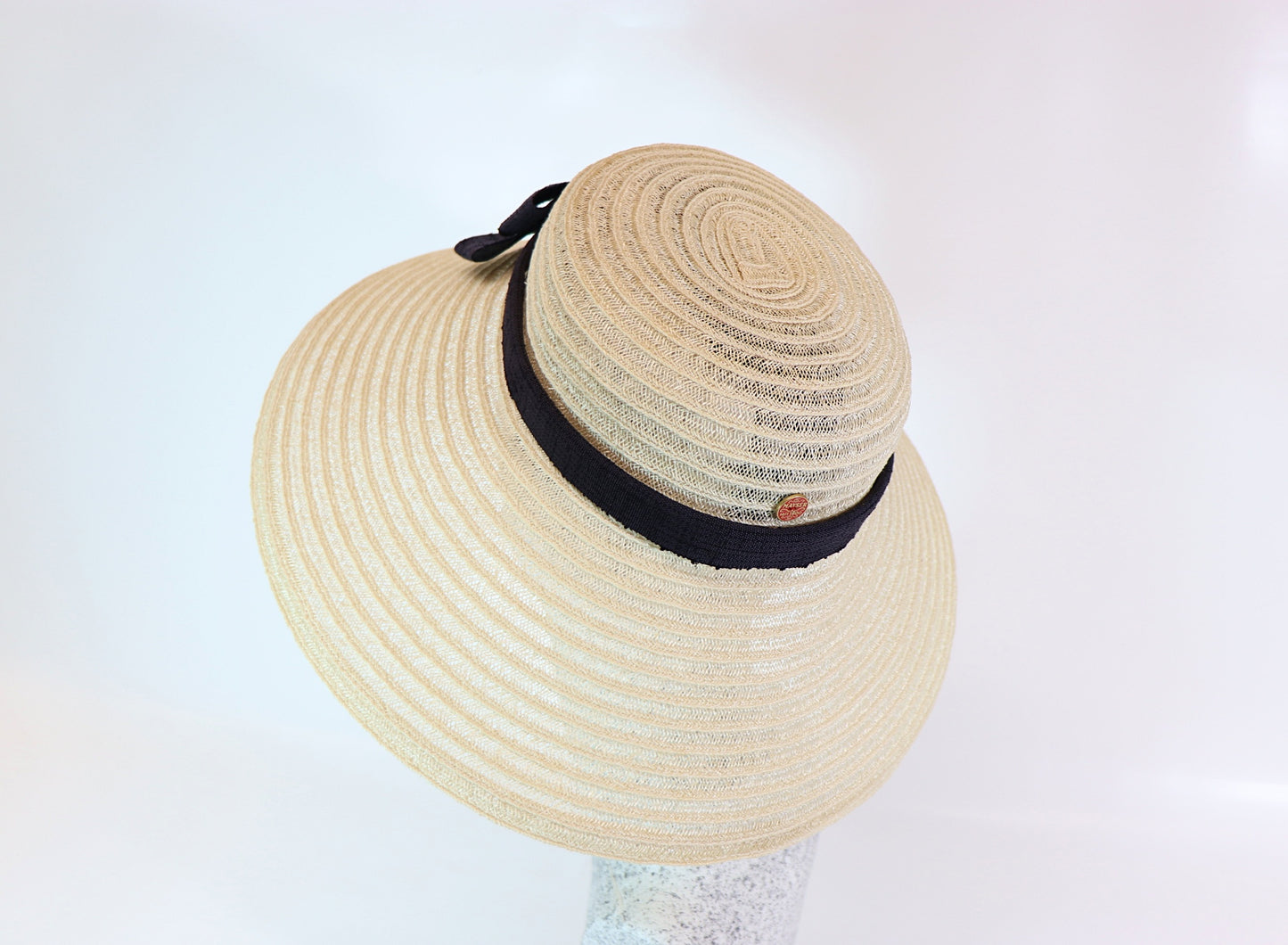 Audrey H. - Straw hat with bow