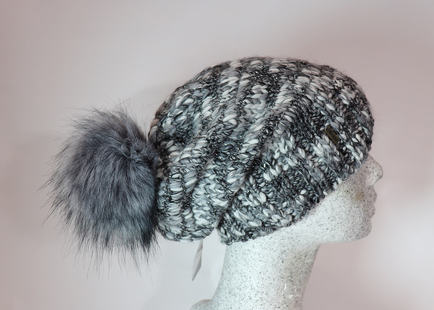 A Morelli Slouch with faux fur pompom