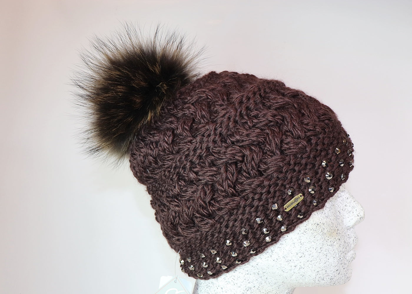 Wool beanie colored diamonds and Finnracoon bobble