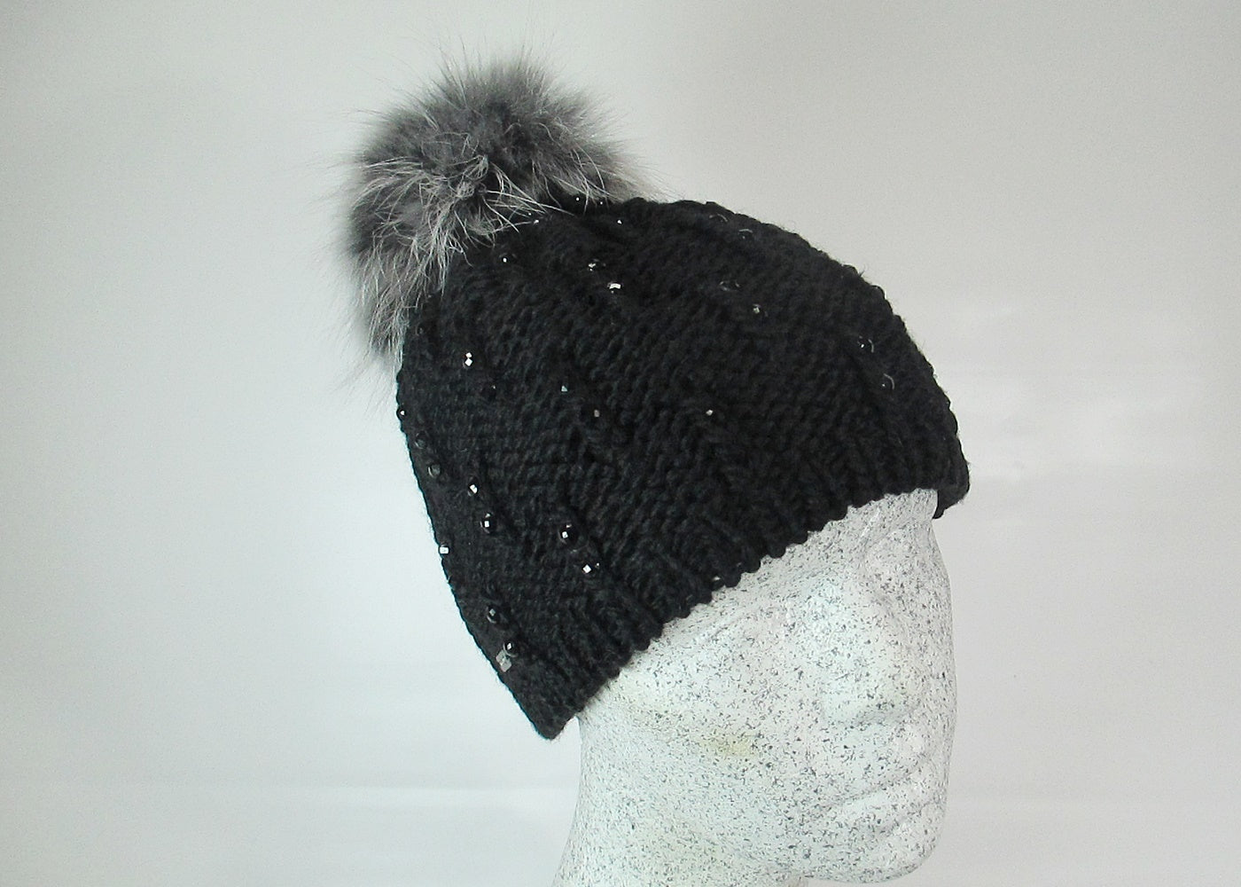 Wool beanie colored diamonds - Finnracoon bobble