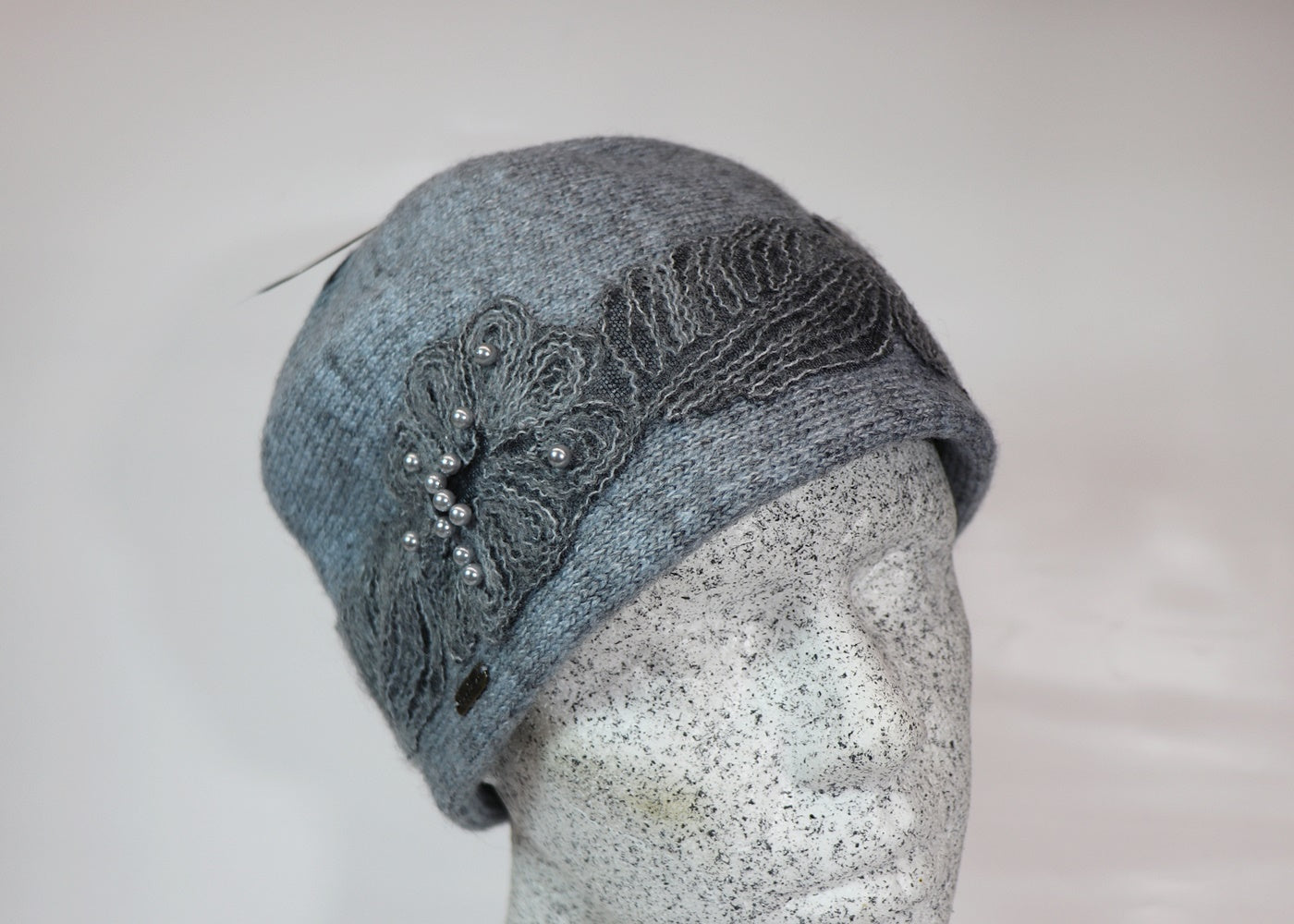 Wool beanie with lace appliqué