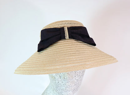 Audrey H. - Straw hat with bow