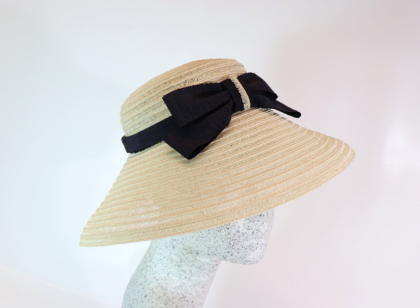 Audrey H. - Straw hat with bow
