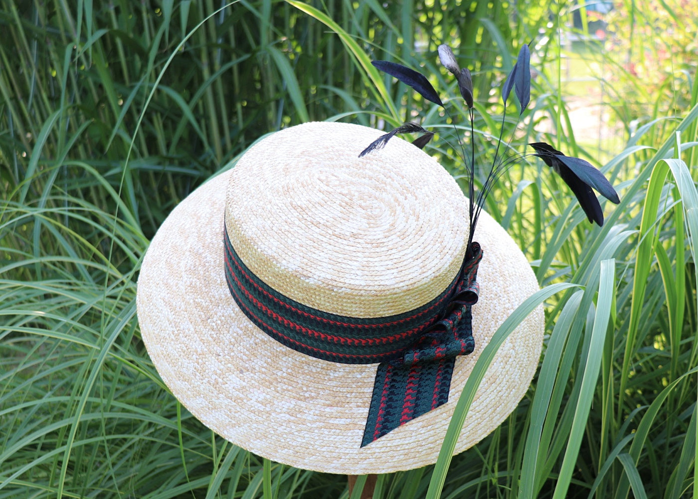 Braided straw hat in natural color with a wide band
